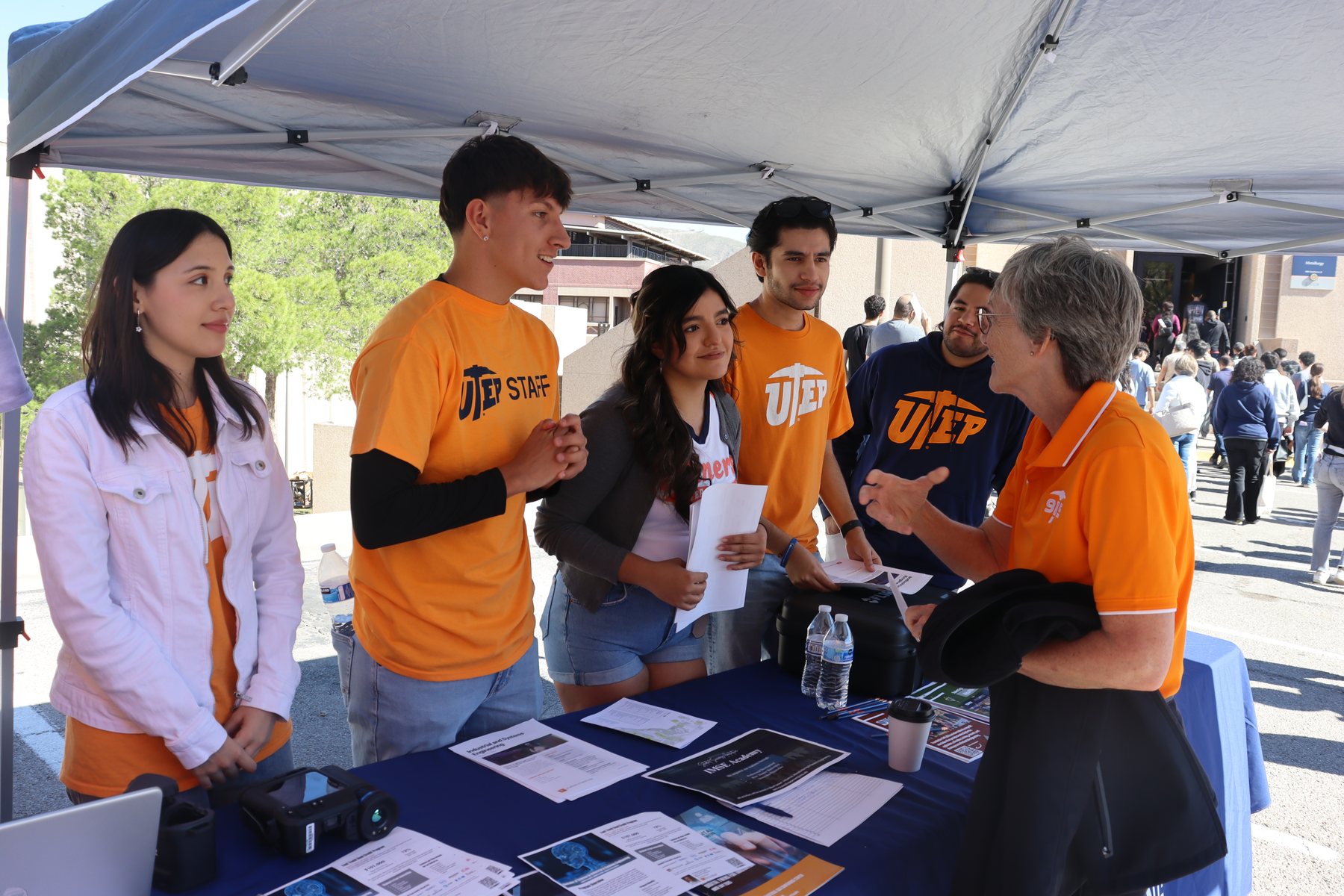 IMSE outreach conversations with students at Orange and Blue Day